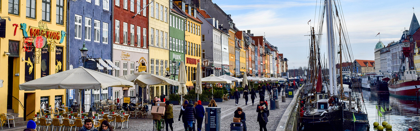 Iconic buildings line the riverbank of Copenhagen.