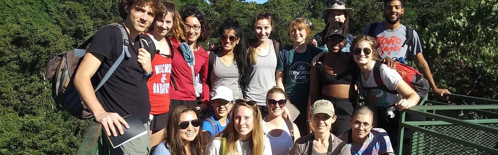 Students are gathered together for the photo. They are smiling at the camera.