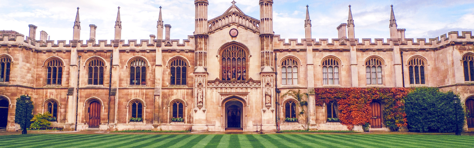 Outside of a Cambridge University building, highlighting the old architecture.
