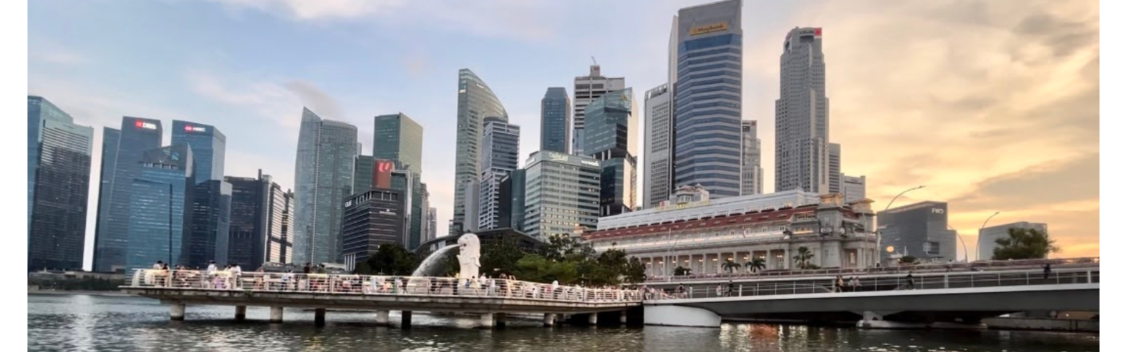 Singapore's waterfront skyline of modern buildings during the day.